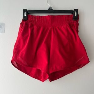 Red Lululemon Shorts high rise 4 in size 2